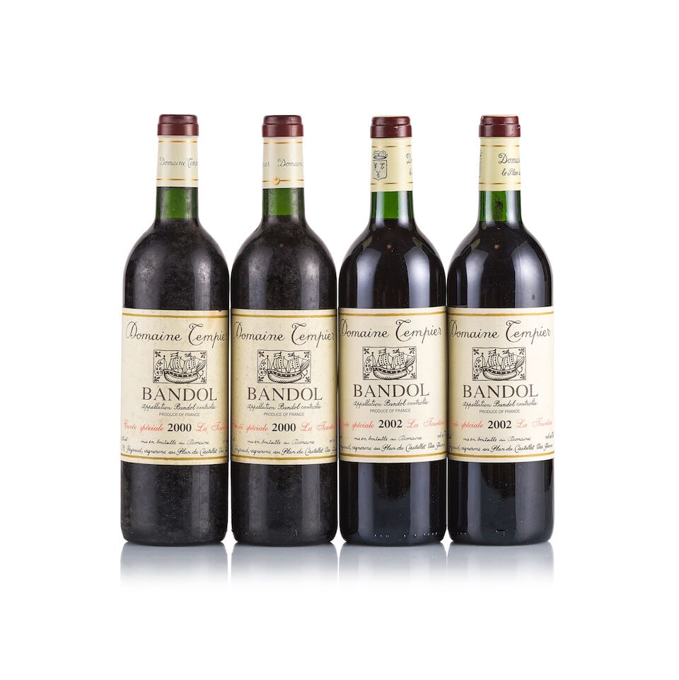 Domaine Tempier, Bandol, La Tourtine, 2000 & 2002 (4 x 750ml): Domaine Tempier, Bandol, La Tourtine, 2000 (2 x 750ml) Region: Provence Fill Level: into neck Capsule: ok Cork: ok Label: all bin-soiled and stained Packaging: neutral carton Miscellaneous: 2x stained