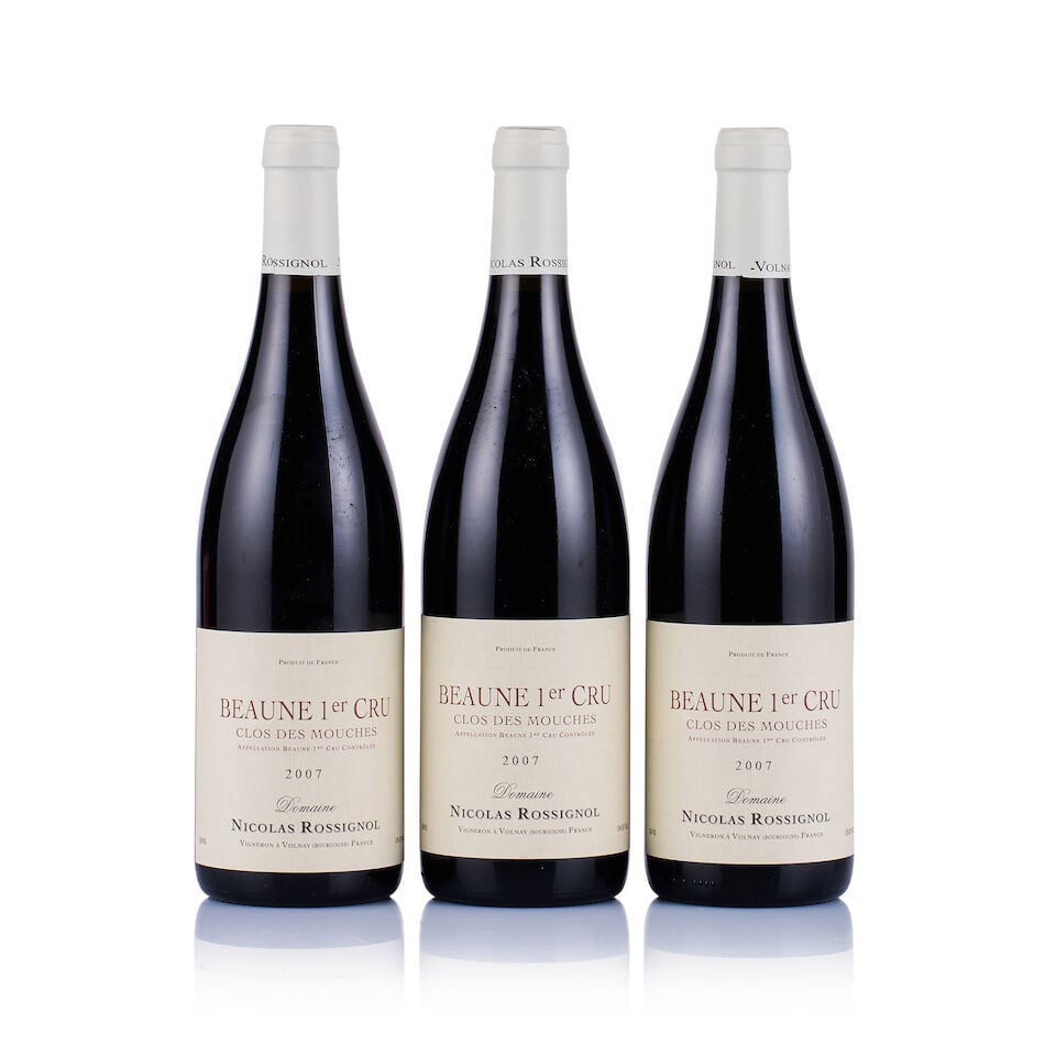 Domaine Nicolas Rossignol, Beaune 1er Cru, Clos des Mouches, 2007 (3 x 750ml): Domaine Nicolas Rossignol, Beaune 1er Cru, Clos des Mouches, 2007 (3 x 750ml) Region: Burgundy Fill Level: excellent Capsule: ok Cork: ok Label: 1x lightly bin-soiled, 2x good appearance Packaging: