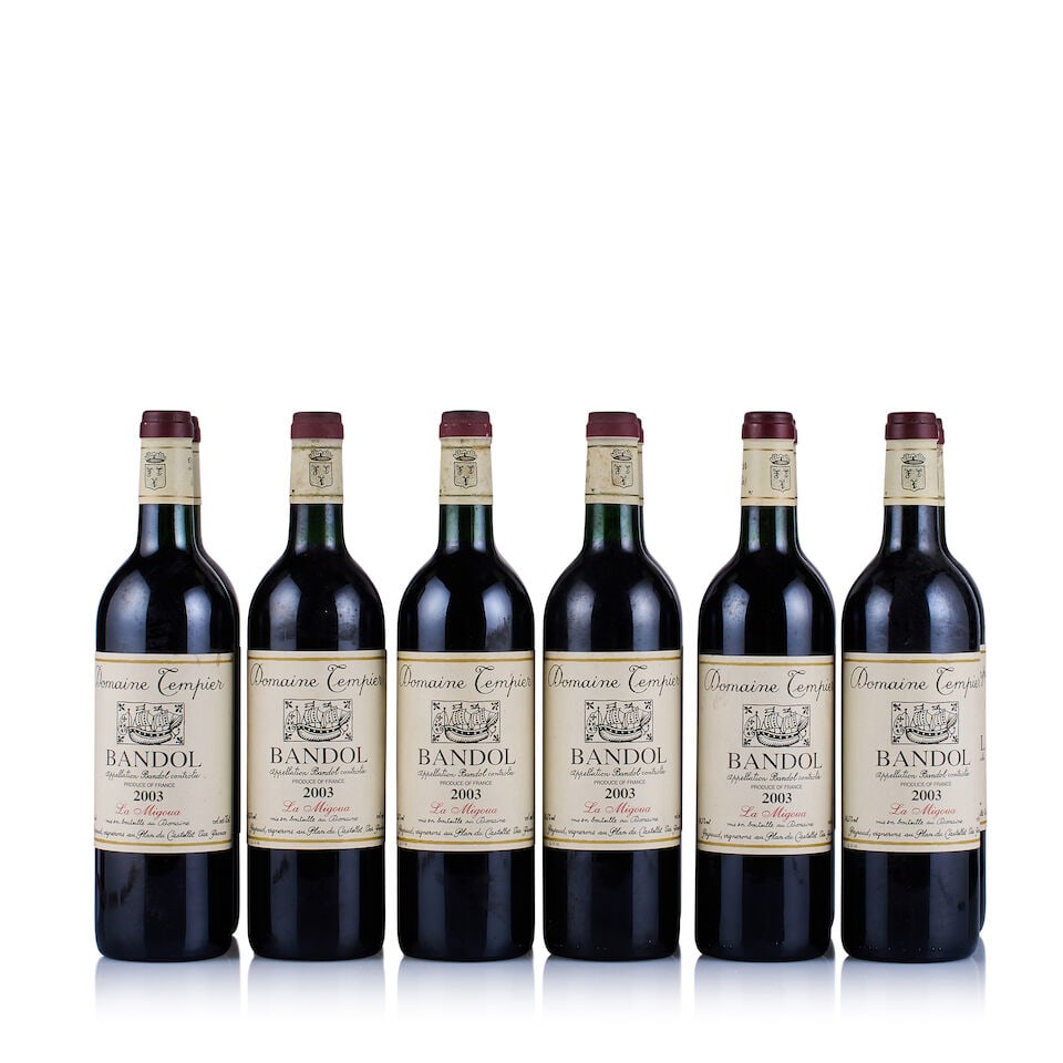 Domaine Tempier, Bandol, La Migoua, 2003 (12 x 750ml): Domaine Tempier, Bandol, La Migoua, 2003 (12 x 750ml) Region: Provence Fill Level: into neck Capsule: stained Cork: ok Label: 6x marked, 6x good appearance Packaging: 2x neutral cartons For further
