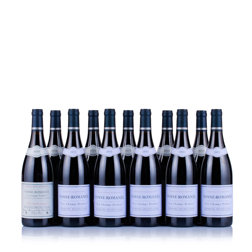 Domaine Bruno Clair, Vosne-Romanée, Les Champs Perdrix, 2010 & 2011 (11 x 750ml): Domaine Bruno Clair, Vosne-Romanée, Les Champs Perdrix, 2010 (6 x 750ml) Region: Burgundy Fill Level: excellent Capsule: ok Cork: ok Label: 3x nicked, 3x good appearance Packaging: 2x neutral car