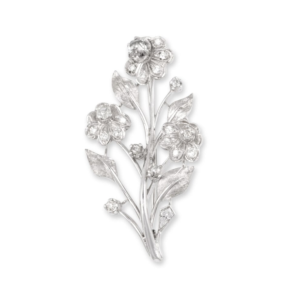 DIAMOND 'FLOWER' BROOCH BROCHE 'FLEURS' DIAMANTS: DIAMOND 'FLOWER' BROOCH BROCHE 'FLEURS' DIAMANTS • French import marks for 18 carat white gold (750 ‰) • 1 fancy-cut and numerous single and old brilliant-cut diamonds weighing