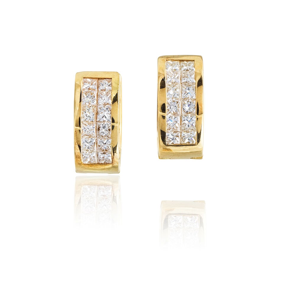 PAIR OF DIAMOND EARRINGS PAIRE DE BOUCLES D'OREILLES DIAMANTS: PAIR OF DIAMOND EARRINGS PAIRE DE BOUCLES D'OREILLES DIAMANTS • French import mark for 18 carat yellow gold (750 ‰) • Openwork details • 24 princess-cut diamonds weighing