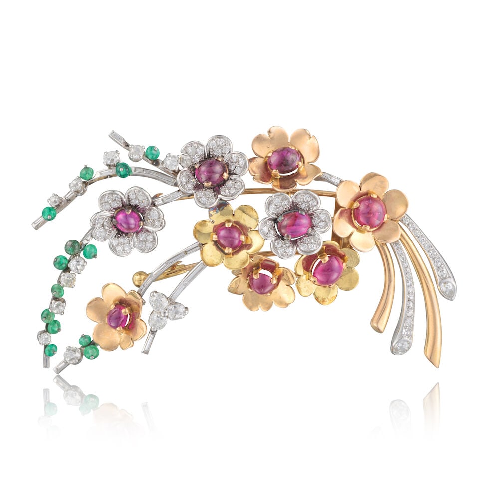 RUBY, EMERALD AND DIAMOND CLIP BROOCH BROCHE RUBIS, ÉMERAUDES ET DIAMANTS: RUBY, EMERALD AND DIAMOND CLIP BROOCH BROCHE RUBIS, ÉMERAUDES ET DIAMANTS • French import mark for 18 carat gold (750 ‰) and for platinum (850 ‰) • Designed as a flower bo