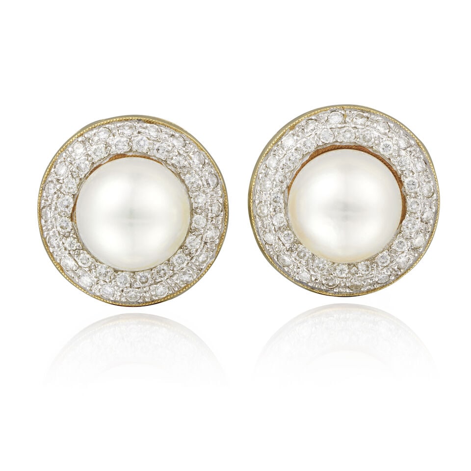 CULTURED PEARL AND DIAMOND EARRINGS PAIRE DE BOUCLES D'OREILLES PERLES DE CULTURE ET DIAMANTS: CULTURED PEARL AND DIAMOND EARRINGS PAIRE DE BOUCLES D'OREILLES PERLES DE CULTURE ET DIAMANTS • French import marks for 18 carat gold (750 ‰) • 2 cultured pearls of white