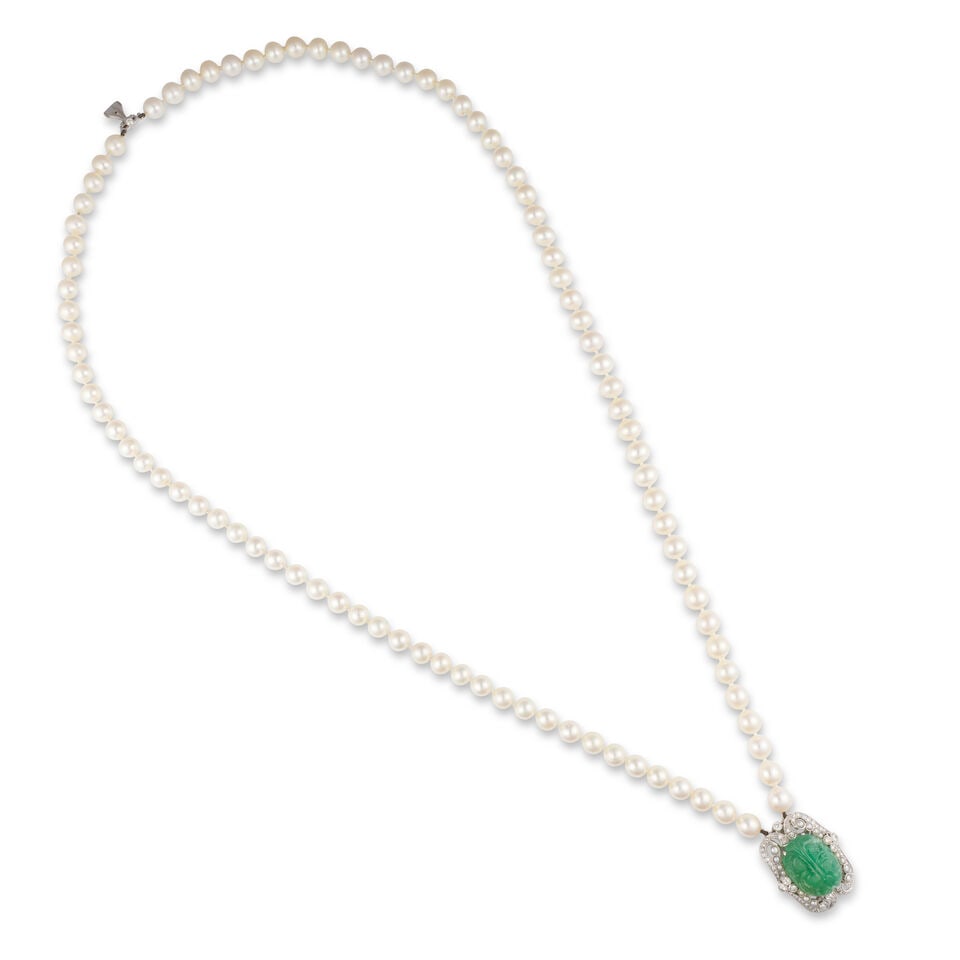 CULTURED PEARL, EMERALD AND DIAMOND NECKLACE COLLIER PERLES DE CULTURE, ÉMERAUDES ET DIAMANTS: CULTURED PEARL, EMERALD AND DIAMOND NECKLACE COLLIER PERLES DE CULTURE, ÉMERAUDES ET DIAMANTS • French import marks for 14 carat white gold (585 ‰) • 2 rows of cultured