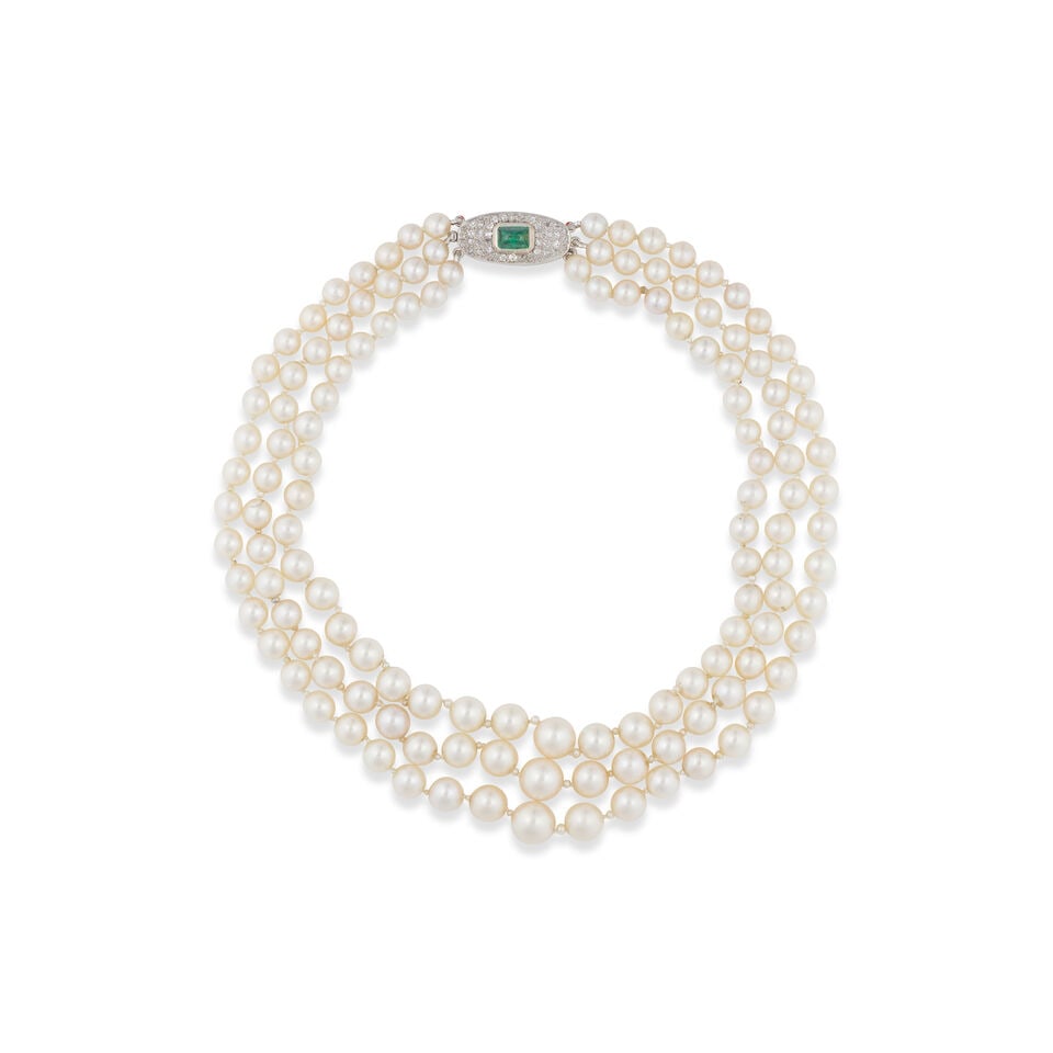PEARL, EMERALD AND DIAMOND NECKLACE COLLIER DE PERLES, ÉMERAUDE ET DIAMANTS: PEARL, EMERALD AND DIAMOND NECKLACE COLLIER DE PERLES, ÉMERAUDE ET DIAMANTS • French import marks for 18 carat white gold (750 ‰) and for platinum (850 ‰) • 3 rows of