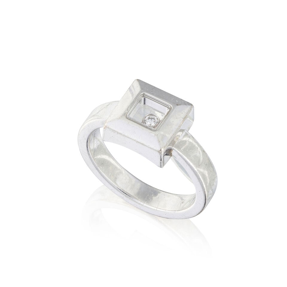 CHOPARD: 'HAPPY DIAMOND' DIAMOND RING CHOPARD: BAGUE DIAMANT 'HAPPY DIAMOND': CHOPARD: 'HAPPY DIAMOND' DIAMOND RING CHOPARD: BAGUE DIAMANT 'HAPPY DIAMOND' • French import mark for 18 carat white gold (750 ‰) • Set with a floating brilliant-cut diamond • 