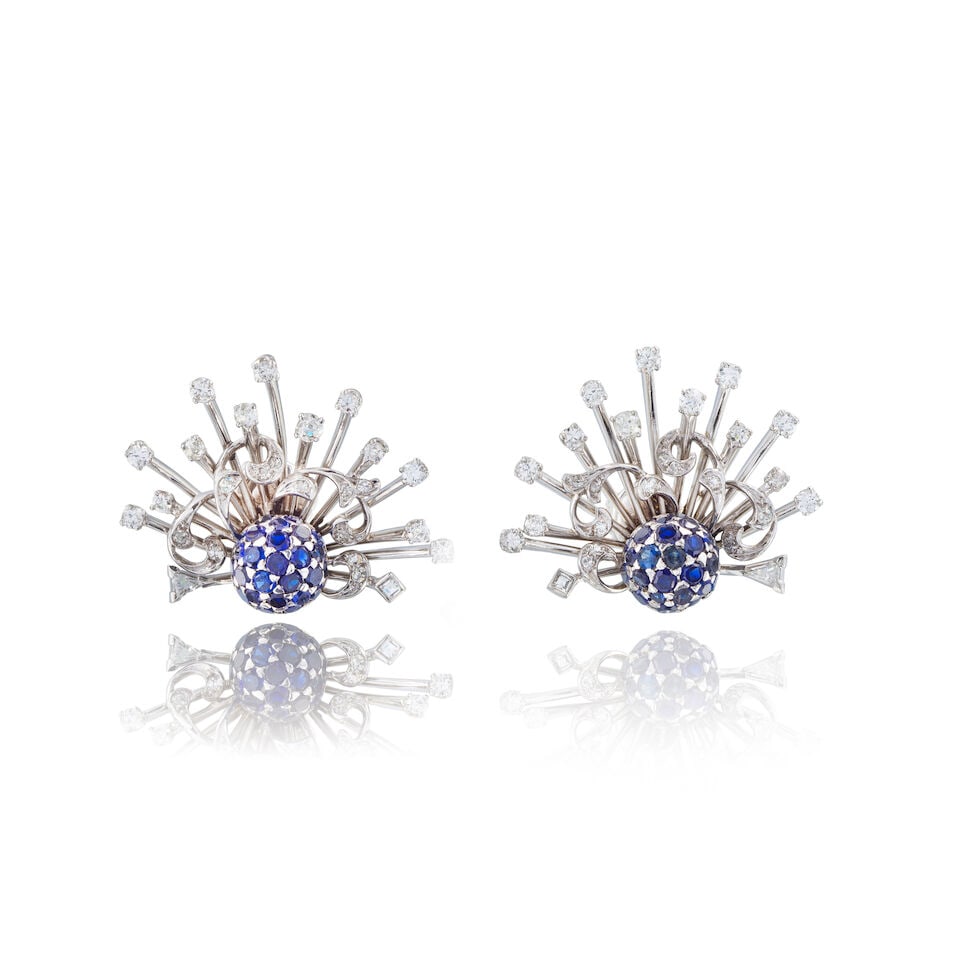 PAIR OF SAPPHIRE AND DIAMOND EARRINGS PAIRE DE BOUCLES D'OREILLES SAPHIRS ET DIAMANTS: PAIR OF SAPPHIRE AND DIAMOND EARRINGS PAIRE DE BOUCLES D'OREILLES SAPHIRS ET DIAMANTS • Tested for palladium • Circular-cut sapphires weighing approximately 1.60 carat total •