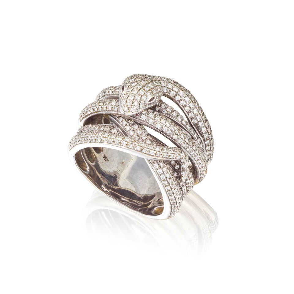 'SNAKE' DIAMOND RING BAGUE DIAMANTS 'SERPENT': 'SNAKE' DIAMOND RING BAGUE DIAMANTS 'SERPENT' • French assay mark for 18 carat white gold (750 ‰) • Designed as a snake, pavé-set with numerous brilliant-cut diamonds •