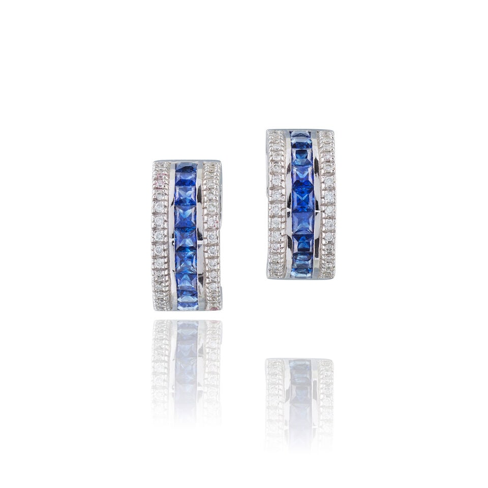 SAPPHIRE AND DIAMOND EARRINGS BOUCLES D'OREILLES SAPHIR ET DIAMANTS: PAIR OF SAPPHIRE AND DIAMOND EARRINGS PAIRE DE BOUCLES D'OREILLES SAPHIRS ET DIAMANTS • French import mark for 14 carat white gold (585 ‰) • 18 square-shaped sapphires weighing