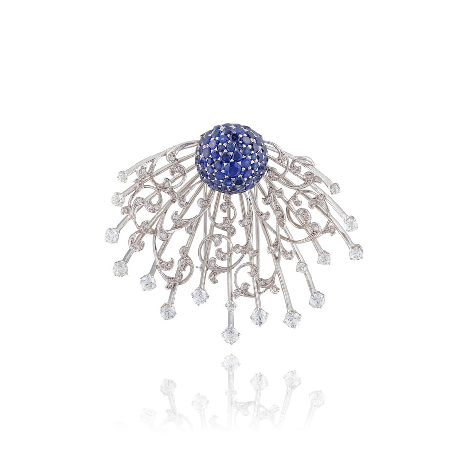 SAPPHIRE AND DIAMOND BROOCH BROCHE SAPHIRS ET DIAMANTS: SAPPHIRE AND DIAMOND BROOCH BROCHE SAPHIRS ET DIAMANTS • Tested for palladium • Numerous circular-cut sapphires ​weighing approximately 4 cts total ​ • Numerous