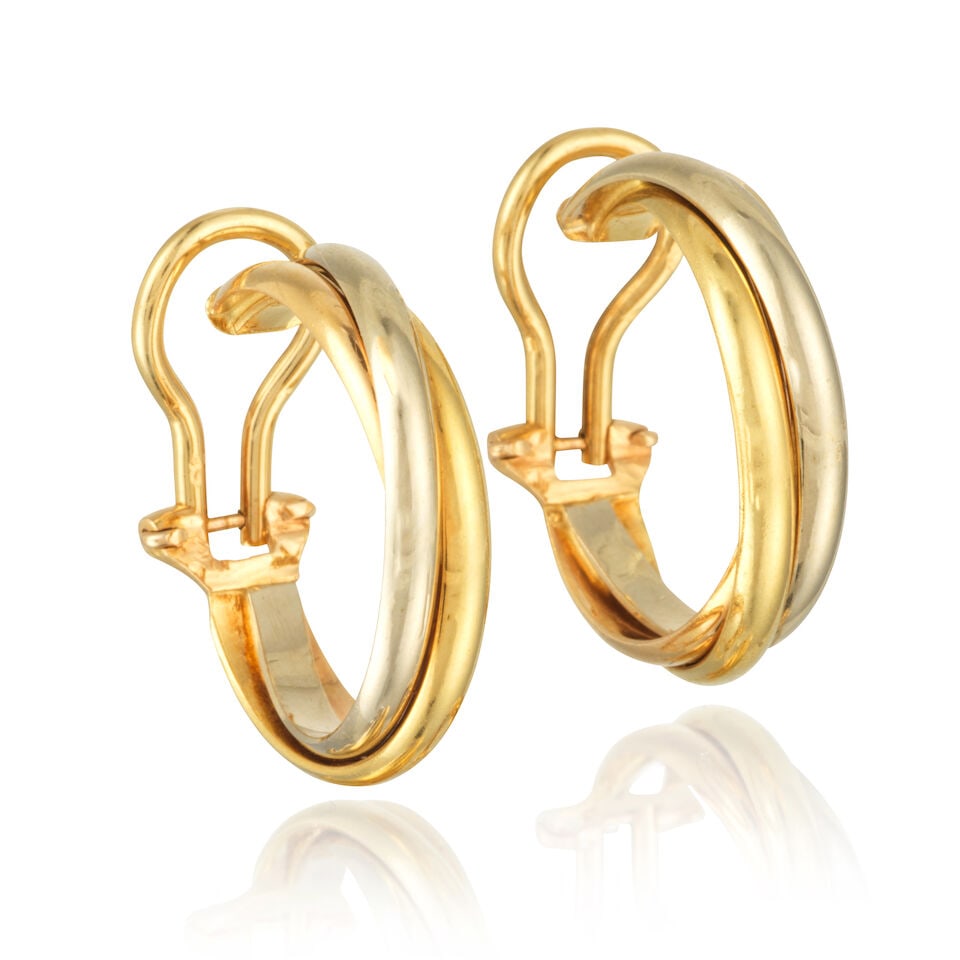 CARTIER: PAIR OF THREE COLOUR-GOLD 'TRINITY' EARCLIPS CARTIER: PAIRE DE CLIPS D'OREILLES 'TRINIT...: CARTIER: PAIR OF THREE COLOUR-GOLD 'TRINITY' EARCLIPS CARTIER: PAIRE DE CLIPS D'OREILLES 'TRINITY' TROIS ORS • French marks for 18 carat gold (750 ‰) • Length 2.2 cm • Total