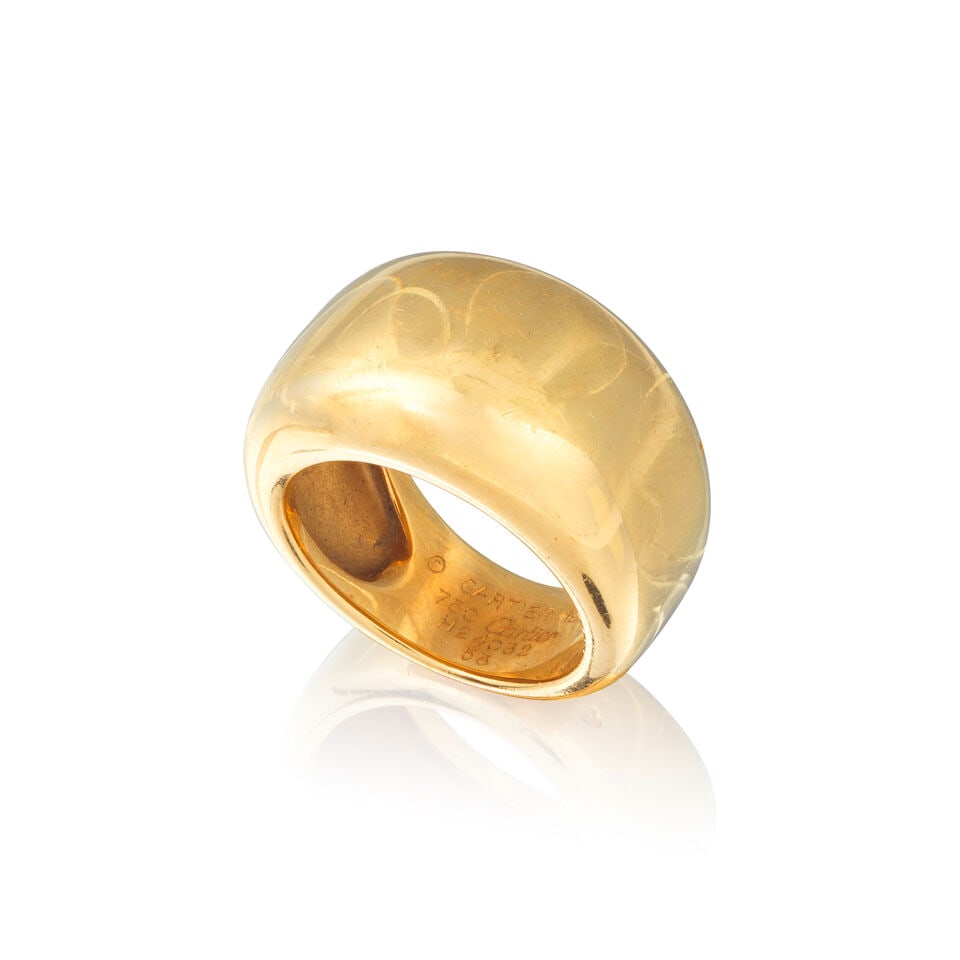 CARTIER: GOLD RING CARTIER: BAGUE EN OR: CARTIER: GOLD RING CARTIER: BAGUE EN OR • French essay mark for 18 carat yellow gold (750 ‰) • Ring size 53 (FR) - M (UK) • Gross weight 15.04 grams • Accompanied by a si