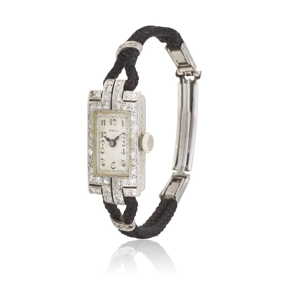 LADY'S DIAMOND WATCH MONTRE DE DAME DIAMANTS: LADY'S DIAMOND WATCH MONTRE DE DAME DIAMANTS • French import mark for platinum (850 ‰) • Single-cut diamonds weighing approximately 0.20-0.30 ct total • Mechanical