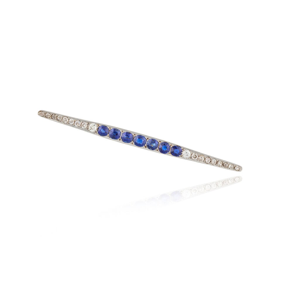 SAPPHIRE AND DIAMOND BROOCH BROCHE SAPHIRS ET DIAMANTS: SAPPHIRE AND DIAMOND BROOCH BROCHE SAPHIRS ET DIAMANTS • French import mark for 18 carat yellow gold (750 ‰) and for platinum (850 ‰) ​ • 7 circular-cut sapphires
