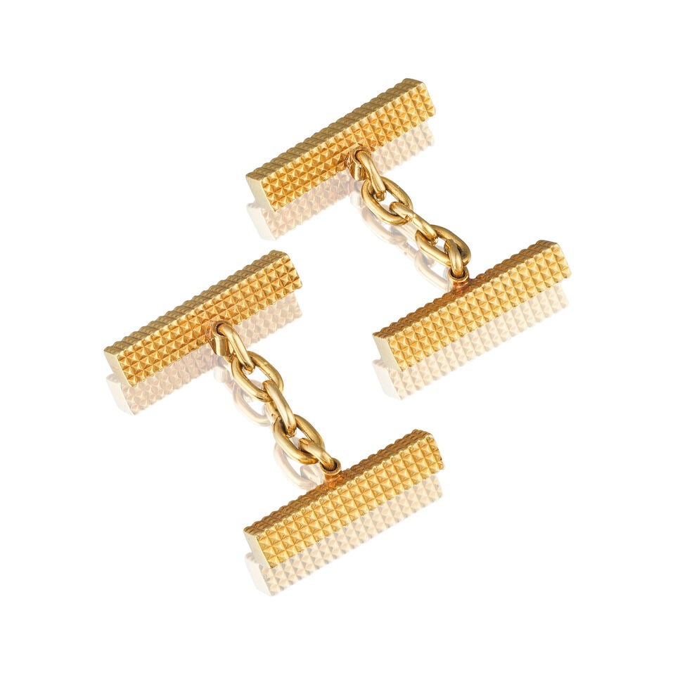 PAIR OF GOLD CUFFLINKS PAIRE DE BOUTONS DE MANCHETTE EN OR: PAIR OF GOLD CUFFLINKS PAIRE DE BOUTONS DE MANCHETTE EN OR • French assay mark for 18 carat yellow gold (750 ‰) ​ • Measurements 2 x 0.3 cm • Gross weight 8.91