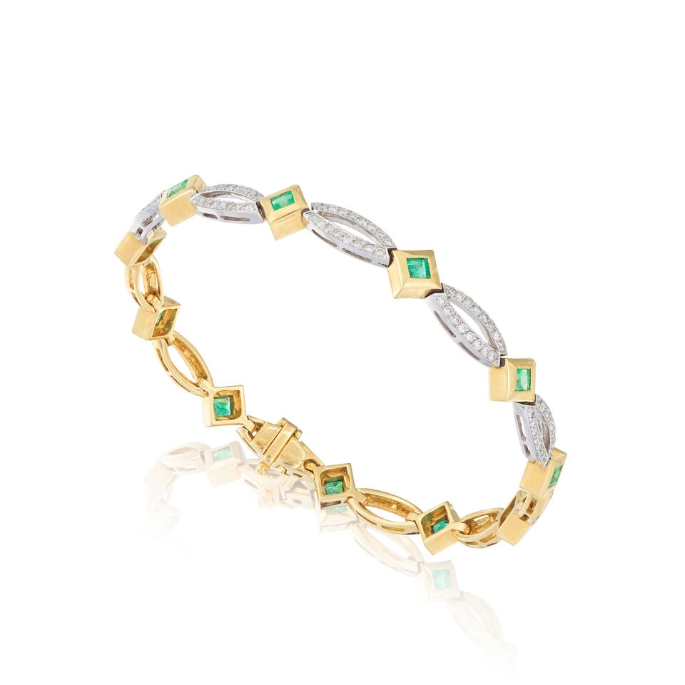 EMERALD AND DIAMOND BRACELET BRACELET ÉMERAUDES ET DIAMANTS: EMERALD AND DIAMOND BRACELET BRACELET ÉMERAUDES ET DIAMANTS • French import mark for 18 carat white and yellow gold (750 ‰) • 11 square-shaped emeralds weighing approximately