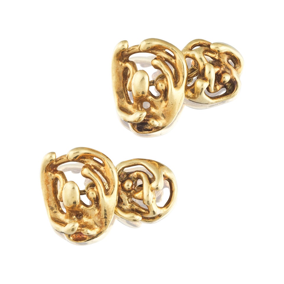 PAIR OF GOLD CUFFLINKS PAIRE DE BOUTONS DE MANCHETTE EN OR: PAIR OF GOLD CUFFLINKS PAIRE DE BOUTONS DE MANCHETTE EN OR • French assay mark for 18 carat yellow gold (750 ‰) ​ • Measurements 1.5 x 1.3 x 2 cm​ • Gross weight 12