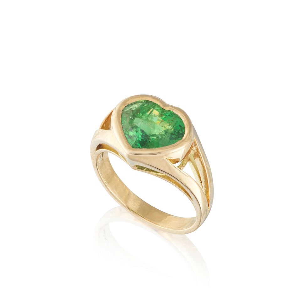 GARNET 'HEART' RING BAGUE GRENAT 'COEUR': GARNET 'HEART' RING BAGUE GRENAT 'COEUR' • French assay mark for 18 carat yellow gold (750 ‰) ​ • Heart-cut tsavorite garnet ​weighing 5.15 cts​ • Ring size