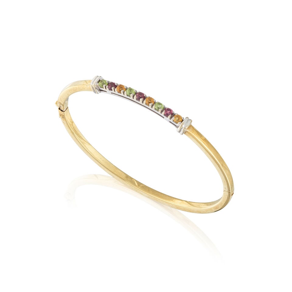 GEM-SET HINGED BRACELET BRACELET JONC PIERRES GEMMES: GEM-SET HINGED BRACELET BRACELET JONC PIERRES GEMMES • French import marks for 18 carat gold (750 ‰) • 3 circular-cut citrines • 3 circular-cut peridots • 3 circular-cut 