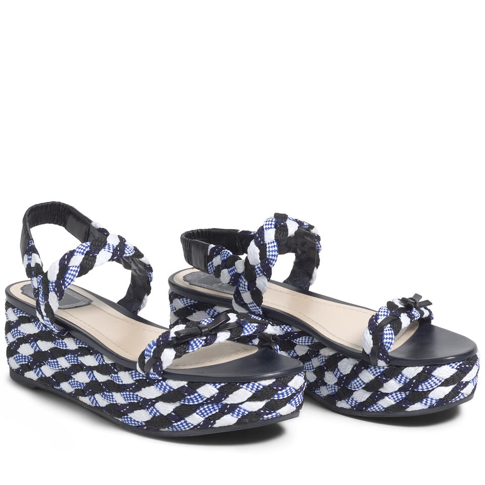 CHRISTIAN DIOR: TRICOLOR BRAIDED PLATFORM SANDALS 2014 | Raf Simons: CHRISTIAN DIOR: TRICOLOR BRAIDED PLATFORM SANDALS 2014 | Raf Simons • Tricolor Braided Fabric Exterior with Black Bow Detail • Marked Size 39 1/2 For further information on this lot