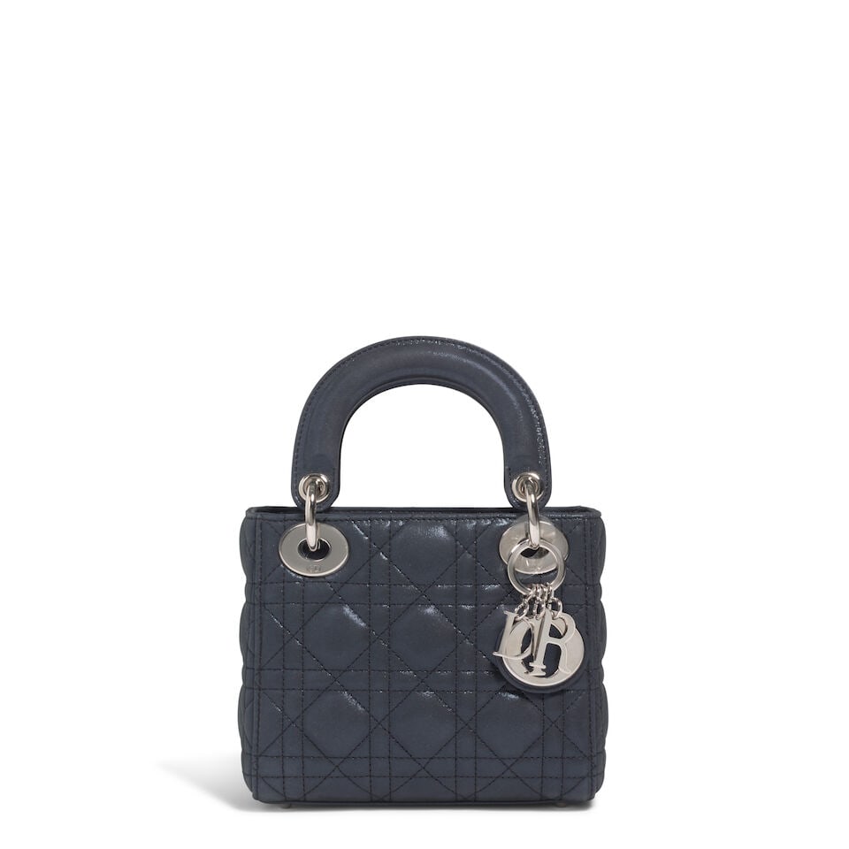 CHRISTIAN DIOR: NAVY CANNAGE IRIDESCENT MINI LADY DIOR 2015 | Raf Simons: CHRISTIAN DIOR: NAVY CANNAGE IRIDESCENT MINI LADY DIOR 2015 | Raf Simons • Navy Iridescent Lambskin Cannage Quilted Exterior • Silver Tone Hardware and Protective Feet at Base •