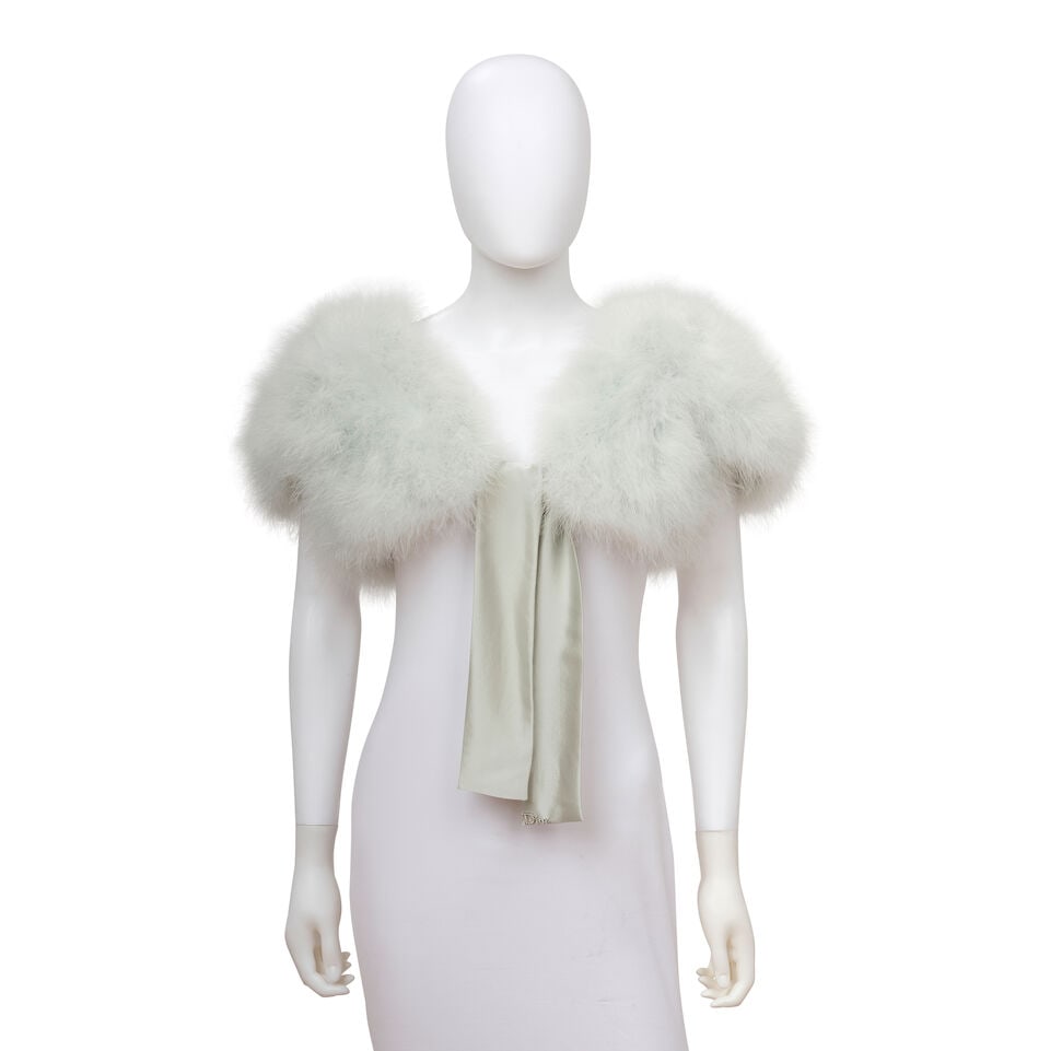CHRISTIAN DIOR: BLUE MARABOU BOLERO 2004 | John Galliano: CHRISTIAN DIOR: BLUE MARABOU BOLERO 2004 | John Galliano • Marked Size Medium • Blue Turkey Hen Feather Exterior with Silk Lined Interior • Silk Tie Closure with Embellished Silver D