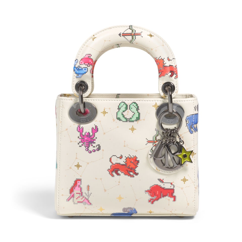 CHRISTIAN DIOR: CREAM PIXEL ZODIAC CALFSKIN MINI LADY DIOR 2022 | Maria Grazia Chiuri: CHRISTIAN DIOR: CREAM PIXEL ZODIAC CALFSKIN MINI LADY DIOR 2022 | Maria Grazia Chiuri • Cream Leather Exterior with Zodiac 8 Bit Detail Throughout • Gunmetal Tone Hardware and Protective