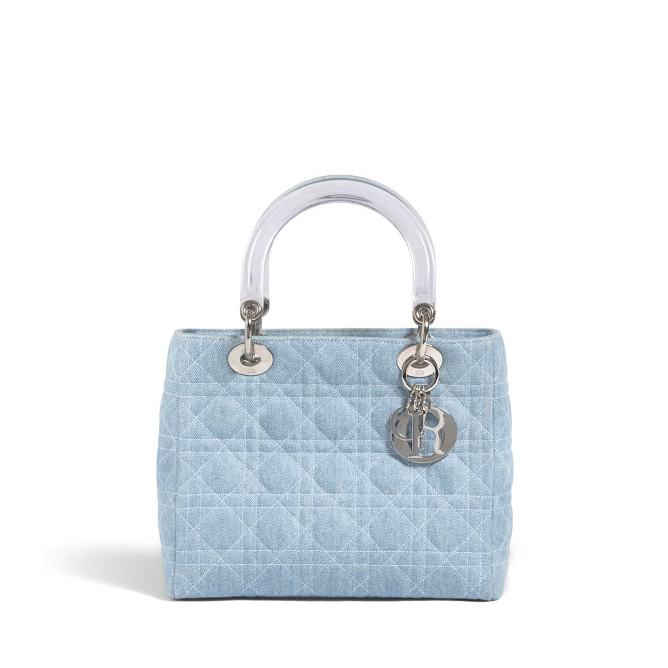 CHRISTIAN DIOR: BLUE JEAN CANNAGE DENIM MEDIUM LADY DIOR 1998 | John Galliano: CHRISTIAN DIOR: BLUE JEAN CANNAGE DENIM MEDIUM LADY DIOR 1998 | John Galliano • Light Wash Blue Denim Cannage Quilted Exterior • Silver Tone Hardware and Protective Feet at Base • Zi