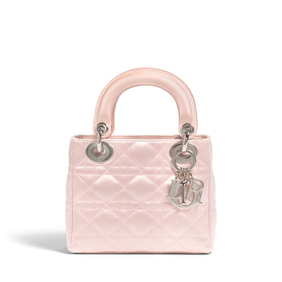 CHRISTIAN DIOR: PINK CANNAGE SATIN MINI LADY DIOR 2004 | John Galliano: CHRISTIAN DIOR: PINK CANNAGE SATIN MINI LADY DIOR 2004 | John Galliano • Pink Satin Cannage Quilted Exterior • Silver Tone Hardware • Fold In Flap Closure • Pink Patent Leather