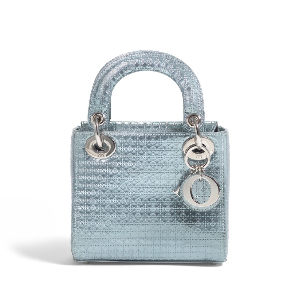 CHRISTIAN DIOR: BLUE METALLIC MICRO CANNAGE PATENT MINI LADY DIOR 2015 | Raf Simons: CHRISTIAN DIOR: BLUE METALLIC MICRO CANNAGE PATENT MINI LADY DIOR 2015 | Raf Simons • Blue Metallic Patent Leather Exterior • Silver Tone Hardware • Fold In Flap Closure •