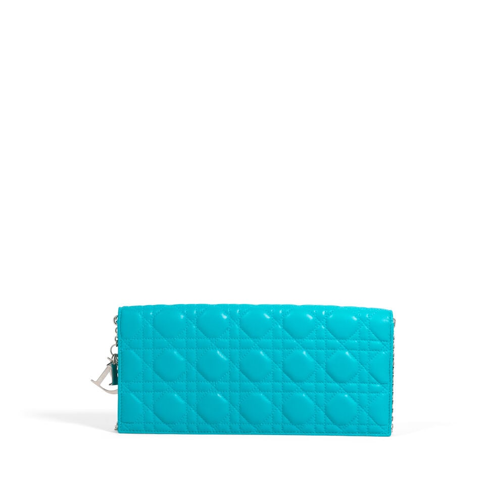 CHRISTIAN DIOR: BLUE CANNAGE LAMBSKIN CONVERTIBLE CLUTCH 2014 | Raf Simons: CHRISTIAN DIOR: BLUE CANNAGE LAMBSKIN CONVERTIBLE CLUTCH 2014 | Raf Simons • Blue Lambskin Cannage Quilted Exterior • Silver Tone Hardware and Logo Charm Detail • Fold Over