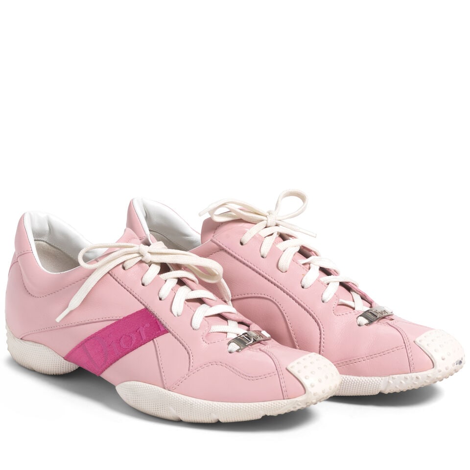 CHRISTIAN DIOR: PINK LEATHER LOW TOP SNEAKERS: CHRISTIAN DIOR: PINK LEATHER LOW TOP SNEAKERS • Pink Leather Exterior with Magenta Dior Ribbon Detail • Marked Size 39 For further information on this lot please visit