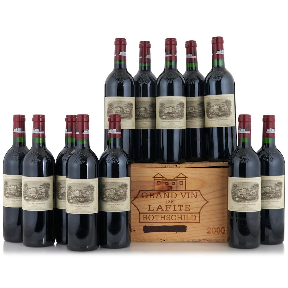 Chateau Lafite Rothschild, 2000 (12 bottles, 750ml): Chateau Lafite Rothschild, 2000 (12 bottles, 750ml) Region: Pauillac Fill Level: bottom neck or better Capsule: three nicked, one wrinkled Packaging: original wooden case Miscellaneous: two with