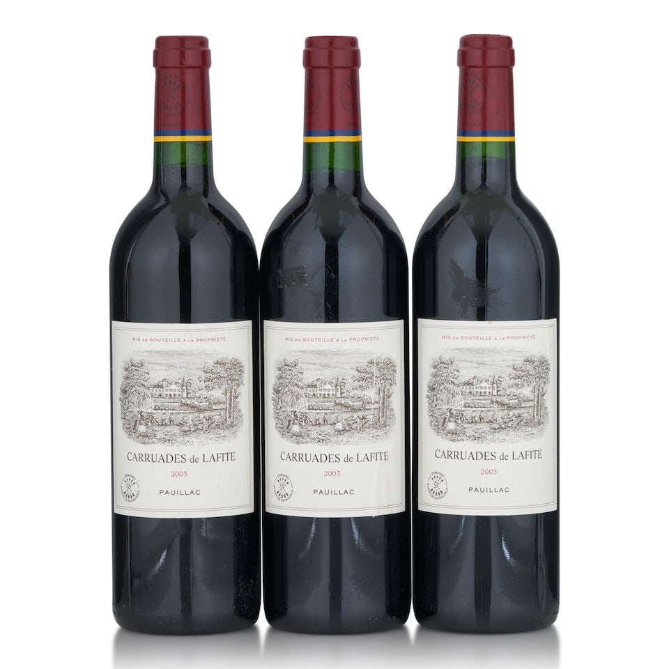 Carruades de Lafite, 2003 (3 bottles, 750ml): Carruades de Lafite, 2003 (3 bottles, 750ml) Region: Pauillac Fill Level: into neck Label: one wrinkled and bin scuffed, one nicked and wrinkled, one lightly wrinkled, lightly bin scuffed, and, lightl