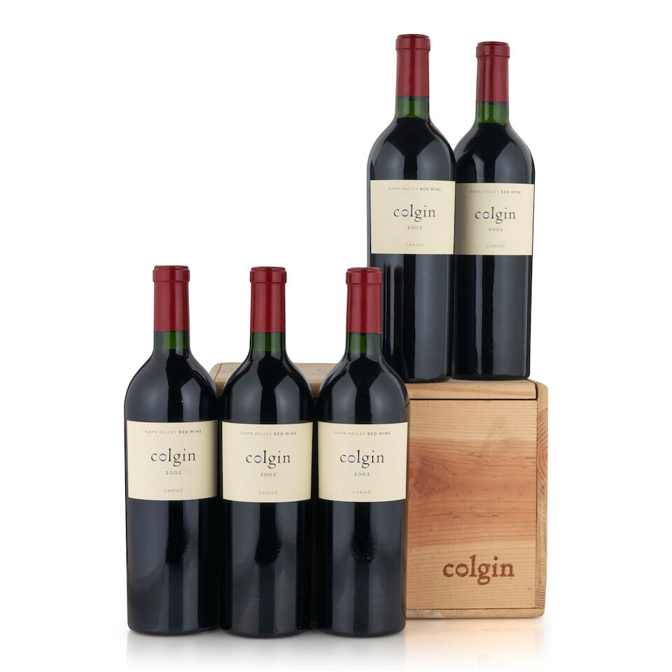 Colgin Cariad, 2002 (5 bottles, 750ml): Colgin Cariad, 2002 (5 bottles, 750ml) Region: Napa Valley Fill Level: bottom neck Packaging: original wooden case Miscellaneous: two with signs of old seepage Footnotes: California This lot is
