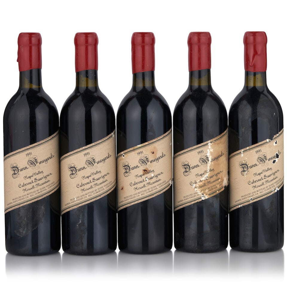 Dunn Howell Mountain, 1991 (5 bottles, 750ml): Dunn Howell Mountain, 1991 (5 bottles, 750ml) Region: Napa Valley Fill Level: bottom neck or better Capsule: bin soiled Label: bin soiled, three nicked with losses, two stained, one heavily