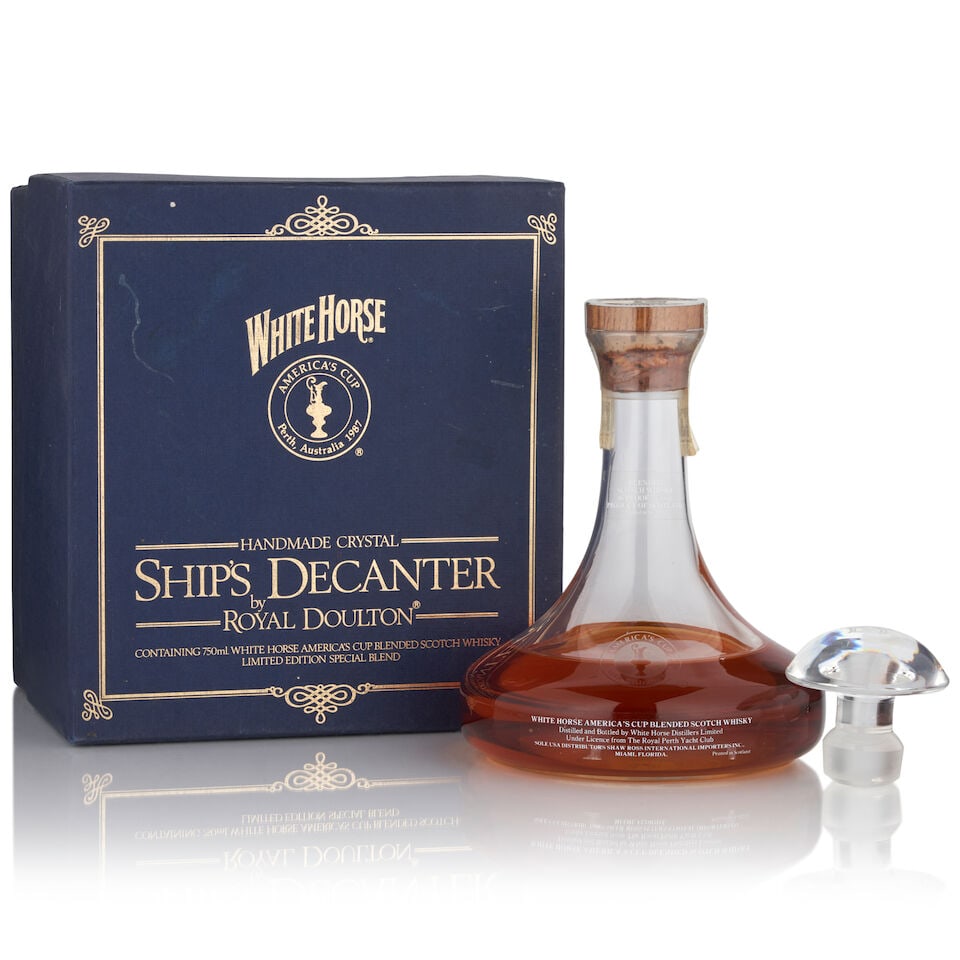 White Horse America's Cup Royal Doulton Ship Decanter (1 750ml): White Horse America's Cup Royal Doulton Ship Decanter (1 750ml) Region: Scotland Fill Level: mid shoulder Packaging: original case, includes stopper Alcohol content: 43% Notes: xx, bottled to commemor