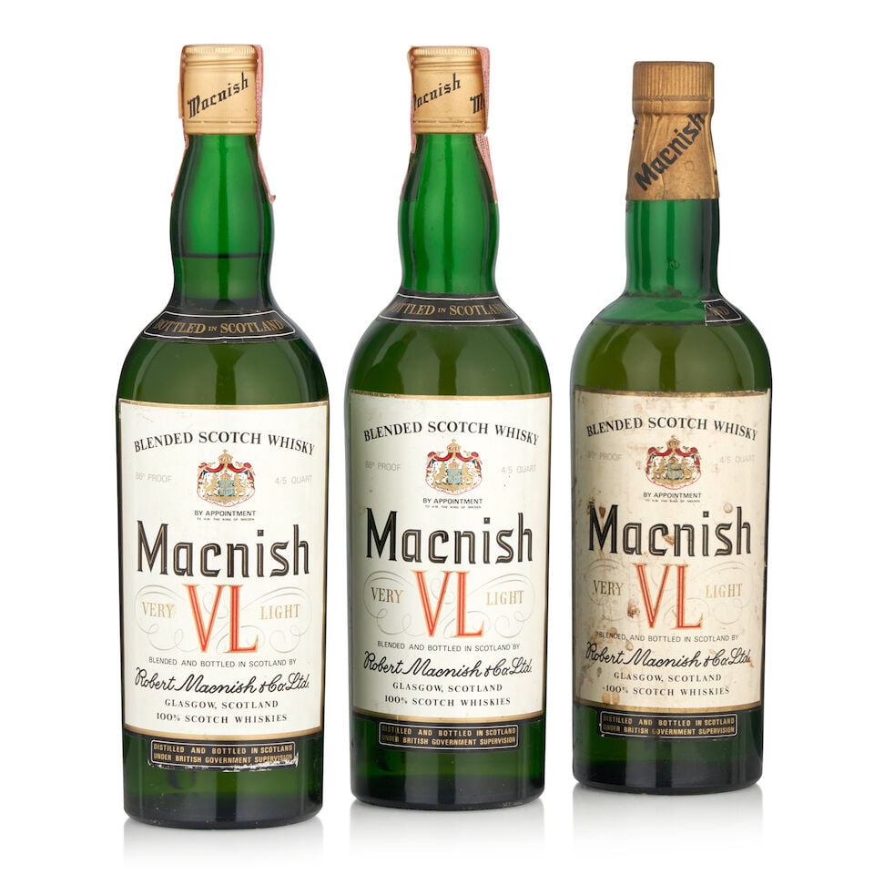 Macnish VL (3 bottles, 4/5qt): Macnish VL (3 bottles, 4/5qt) Region: Scotland Capsule: two with tax strips, one with missing tax strip Label: stained, one with shoulder label mostly missing Alcohol content: 43% Notes: official bott
