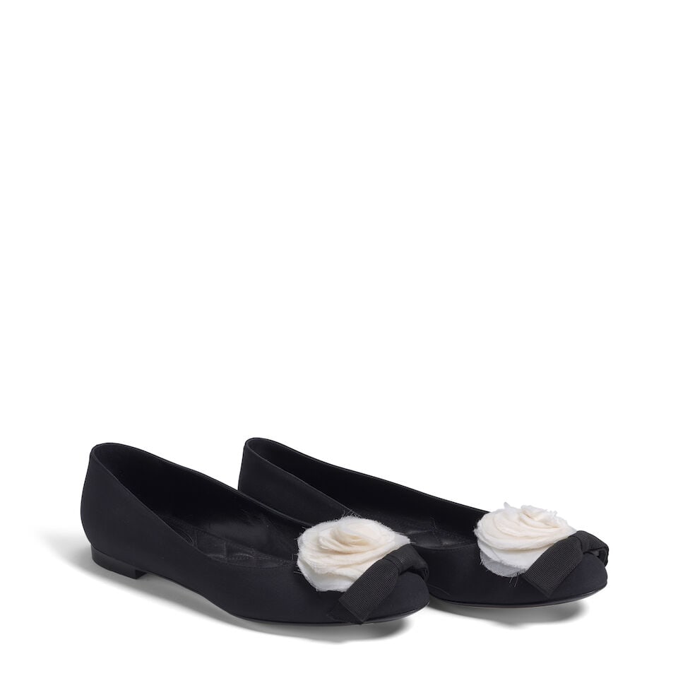 CHANEL: BLACK GROSGRAIN CAMELLIA FLATS: CHANEL: BLACK GROSGRAIN CAMELLIA FLATS • Marked Size 39 1/2 Footnotes: OVERALL CONDITION: Good | Wear throughout. The Condition Report represents Bonhams' reasonable opinion as to the Lot's
