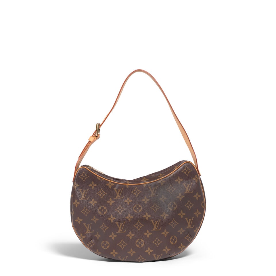 LOUIS VUITTON: MONOGRAM CROISSANT SHOULDER BAG MM 2005: LOUIS VUITTON: MONOGRAM CROISSANT SHOULDER BAG MM 2005 • Monogrammed Coated Canvas with Vachetta Trim Detail • Gold Tone Hardware • Single Shoulder Strap • Zipper Closure ̶