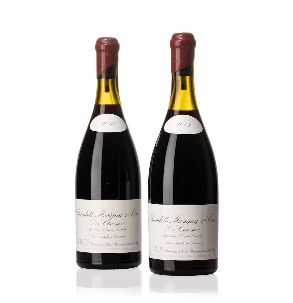 Domaine Leroy Chambolle Musigny Les Charmes, 2013 (5x 750ml): Domaine Leroy Chambolle Musigny Les Charmes, 2013 (5x 750ml) Region: Burgundy Fill Level: 1x 3cm, 1x 3.5cm, 2x 4cm, 1x 5cm Capsule: 1x slightly damaged wax Cork: 5x signs of old seepage Label: 5x slig
