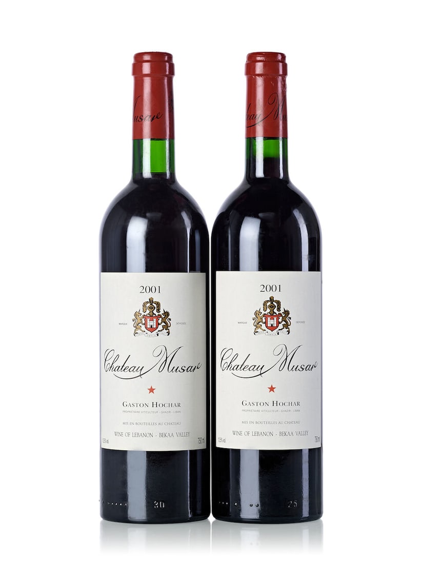 Château Musar Red, 2001 (12x 750ml): Château Musar Red, 2001 (12x 750ml) Region: Lebanon Cork: 1x signs of old seepage Label: 2x slightly torn Packaging: oc Lot to be sold without reserve. For further information on this lot please