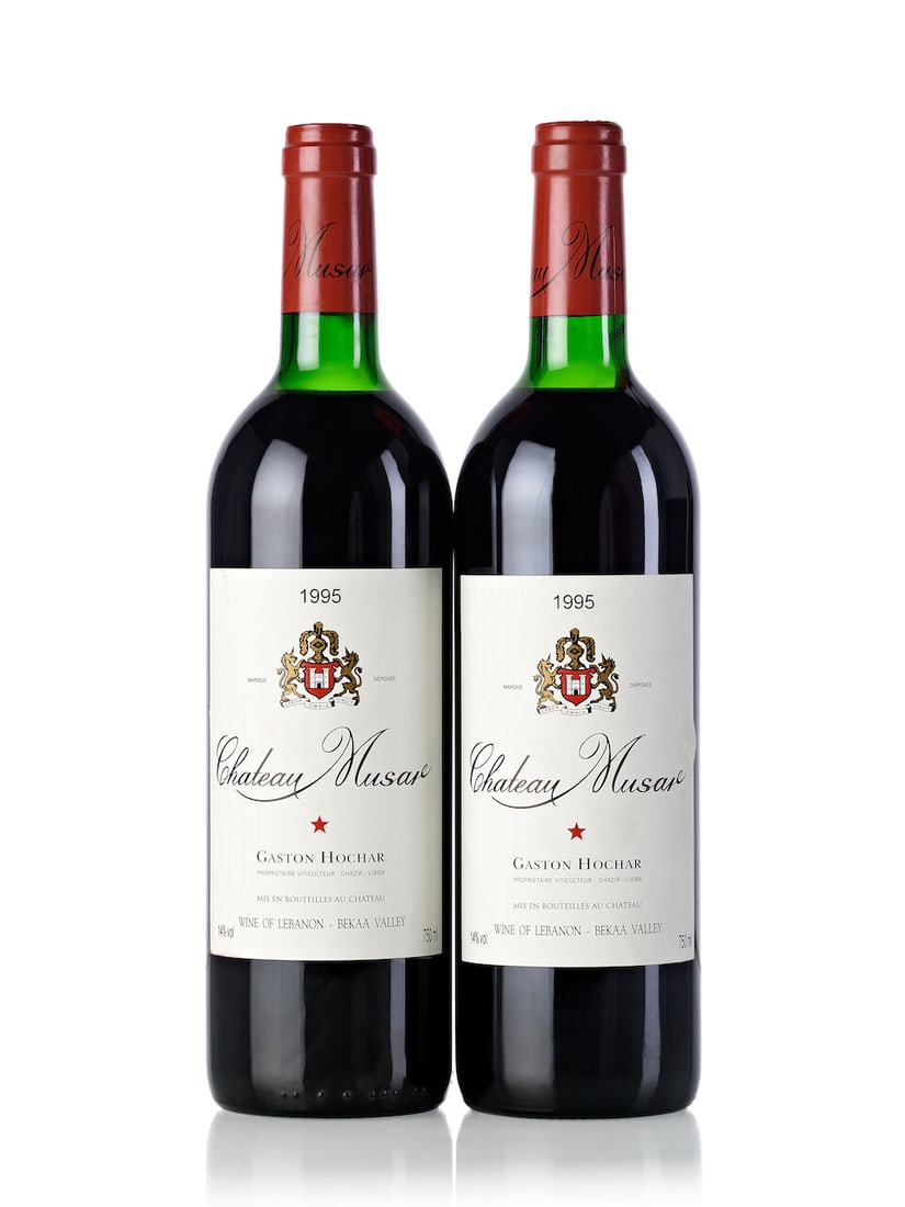Château Musar Red, 1995 (7x 750ml): Château Musar Red, 1995 (7x 750ml) Region: Lebanon Fill Level: 3x top shoulder, 4x upper shoulder Cork: 5x signs of old seepage Label: 2x slightly marked, 4x scuffed, 1x slightly stained Lot to