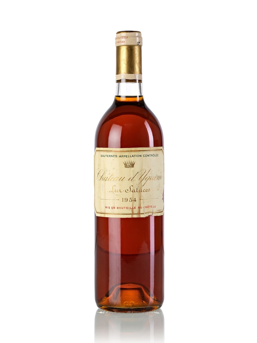 Château d'Yquem, 1954 (1x 750ml): Château d'Yquem, 1954 (1x 750ml) Region: Bordeaux Fill Level: base neck Capsule: slightly torn Label: damp-stained, heavily torn For further information on this lot please visit