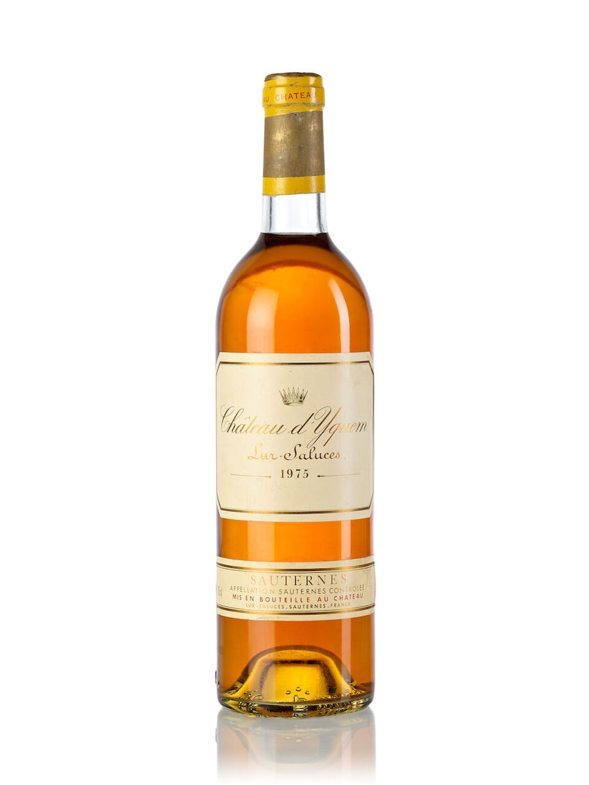 Château d'Yquem, 1975 (1x 750ml): Château d'Yquem, 1975 (1x 750ml) Region: Bordeaux Fill Level: very top shoulder Capsule: slightly oxidized Cork: signs of old seepage Label: slightly damp-stained, slightly torn For further
