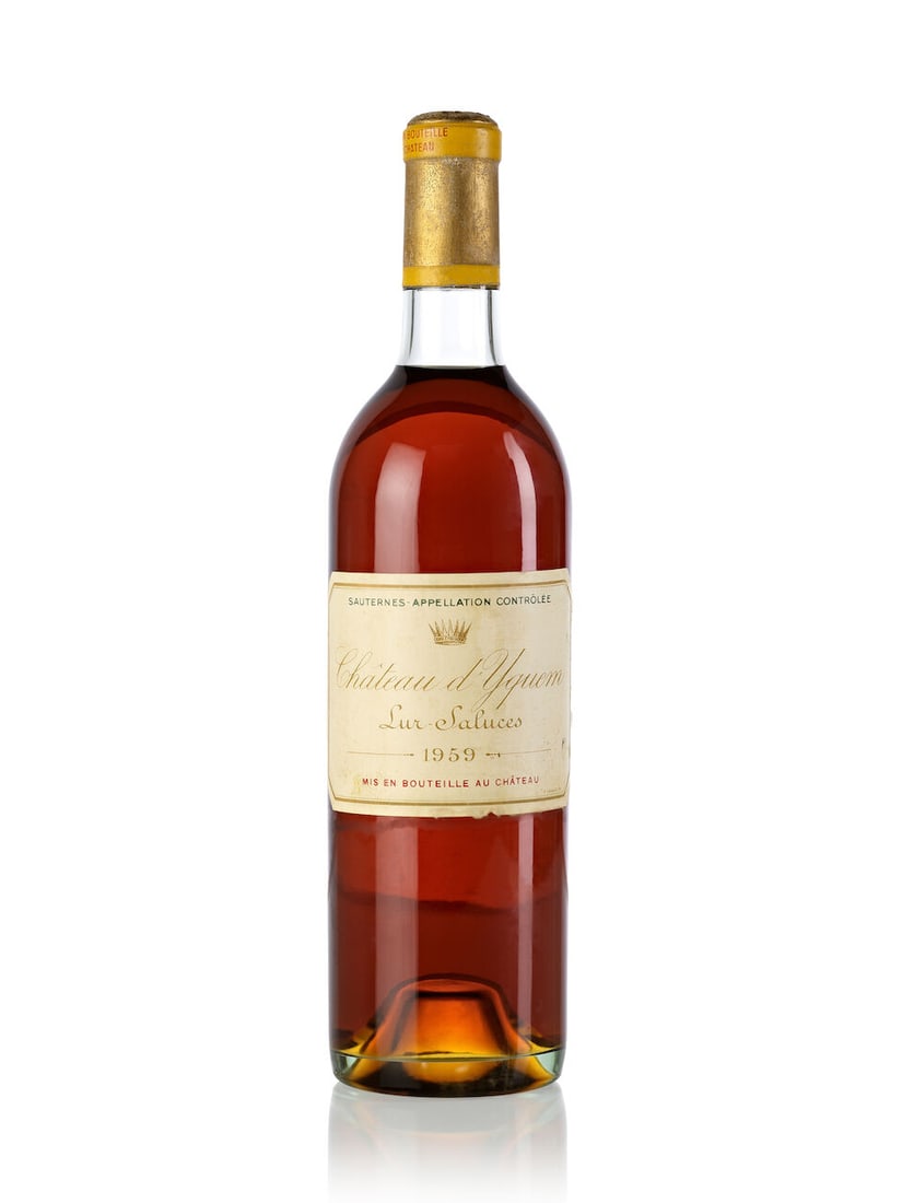 Château d'Yquem, 1959 (1x 750ml): Château d'Yquem, 1959 (1x 750ml) Region: Bordeaux Fill Level: very top shoulder Capsule: oxidized, slightly corroded Cork: protruded, signs of old seepage Label: damp-stained, slightly