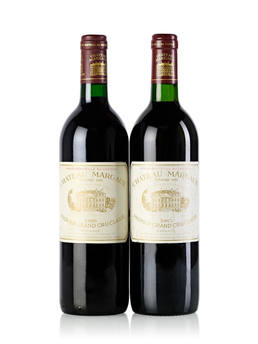 Château Margaux, 1985 (1x 750ml) Château Margaux, 1986 (1x 750ml): Château Margaux, 1985 (1x 750ml) Region: Bordeaux Fill Level: base neck Label: slightly torn and bin-soiled Château Margaux, 1986 (1x 750ml) Region: Bordeaux Fill Level: into neck Label: sli