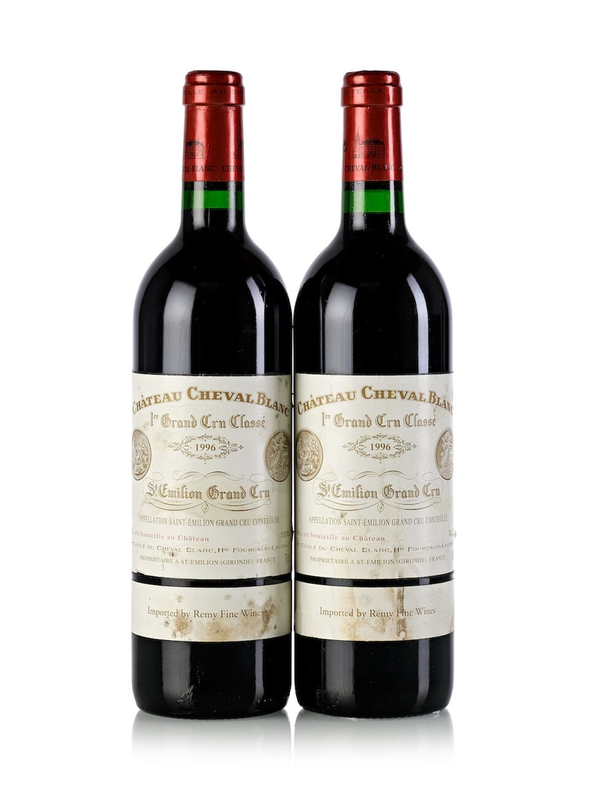 Château Cheval Blanc, 1996 (2x 750ml): Château Cheval Blanc, 1996 (2x 750ml) Region: Bordeaux Fill Level: 2x into neck Label: 2x heavily bin-soiled and wrinkled, 2x HK importer strip labels For further information on this lot please