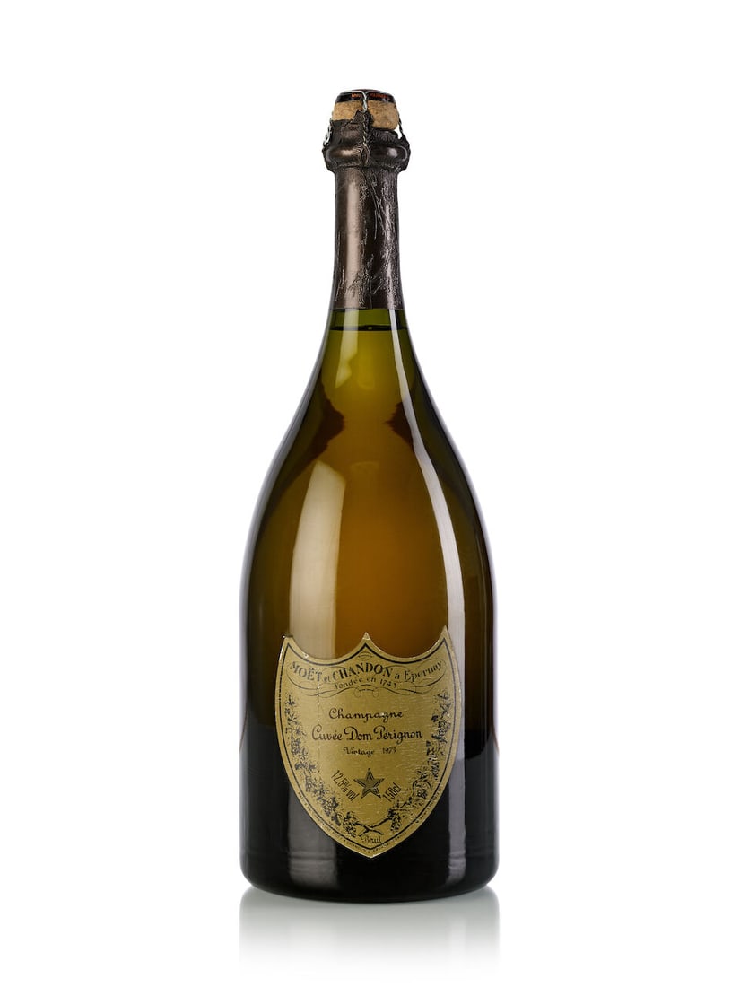 Dom Pérignon, 1975 (1x Magnum): Dom Pérignon, 1975 (1x Magnum) Region: Champagne Fill Level: 1.5cm inverted Capsule: partially missing foil Label: slightly scuffed Miscellaneous: Disgorged on March 2, 1995 Notes: great color Fo